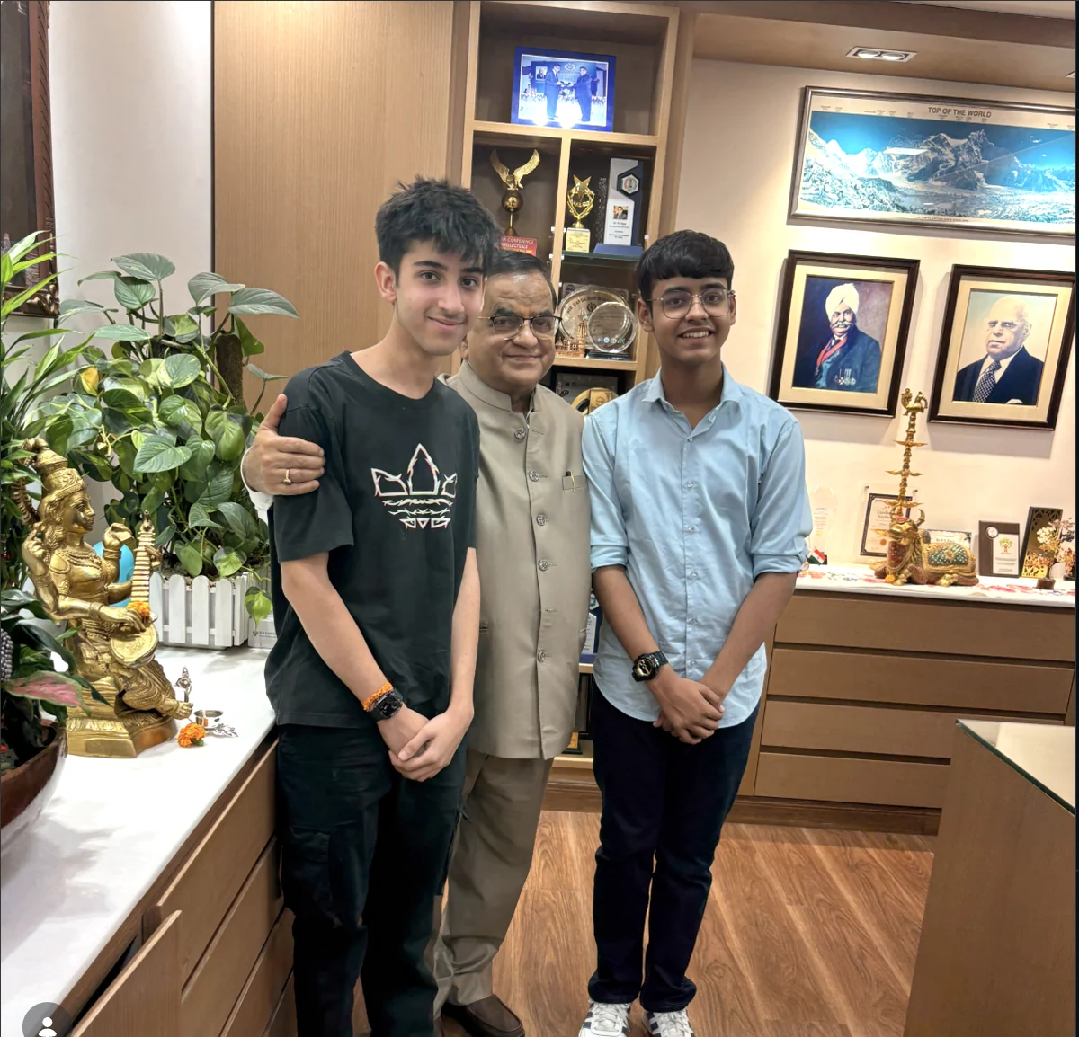 Moksh and a teammate with the chairman supporting the OroScan initiative